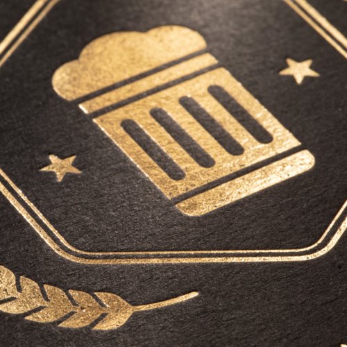 Rund ölmatt med varmfolieprägling.